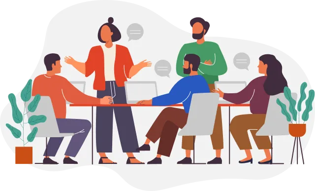 a group of people sitting around a table having a discussion